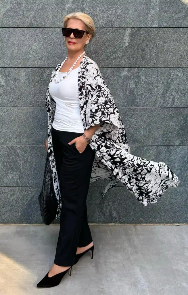Black-and-White Floral Kimono Over a Simple White Top and Black Trousers.